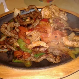 Beef/Chicken fajitas.