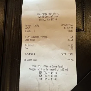 Mexican breakfast receipt with $7 side bacon!