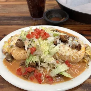 Smothered bacon breakfast burrito.