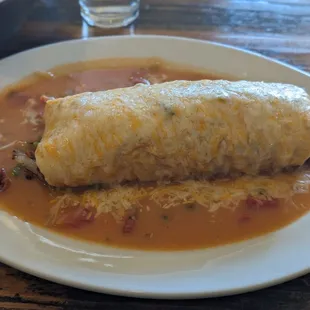 Smothered bacon breakfast burrito