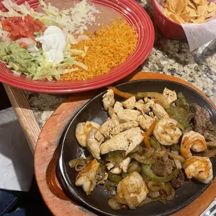 Fiesta fajitas (shrimp, chicken, &amp; beef)
