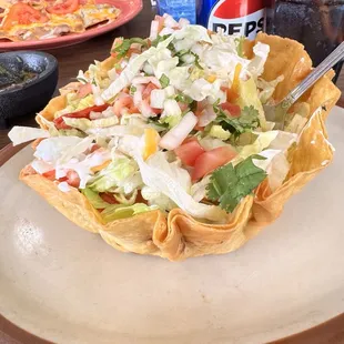 Taco salad made special with veggies for me.