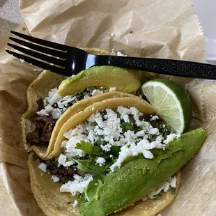Asada Street Tacos with added avocado and queso fresco