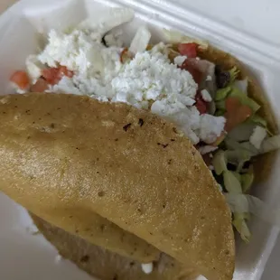 Gordita. Made with what looks like corn tortillas and not masa.