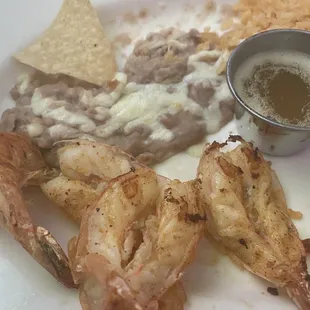 Supposedly Garlic shrimp with no garlic n no butter either, we had to dip them in butter to get some flavor
