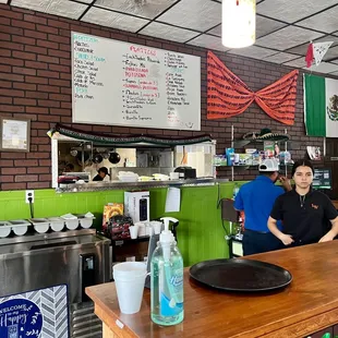 a woman behind the counter