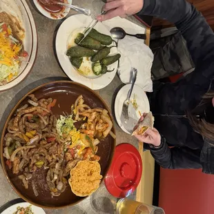 Fajita Sampler. Enough for 2. Amazing tortillas. Jalapeños were amazing.