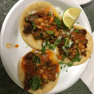 Al pastor tacos $1.50 each! Red sauce is spicy &amp; yummy