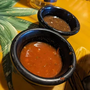 Green and red sauce served with the free table chips