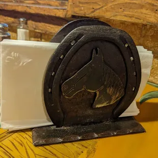 Horseshoe shaped napkin holders...great touch.
