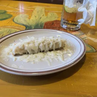 chicken enchilada with queso fresco