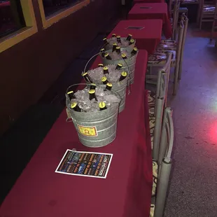 a row of buckets of ice cream