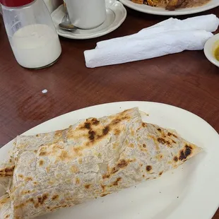 Burrito de Jamon and migas con chorizo.