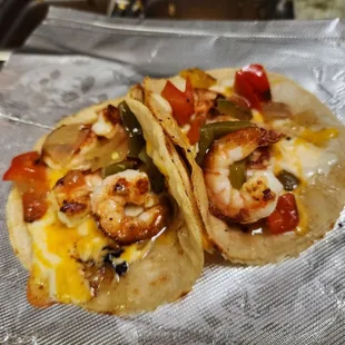 two shrimp tacos