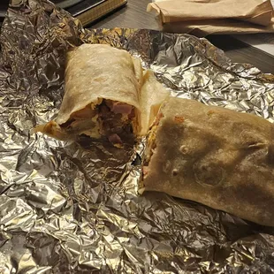 Los Primos Breakfast Burrito: Bacon, ham, eggs, potatoes, cheese.