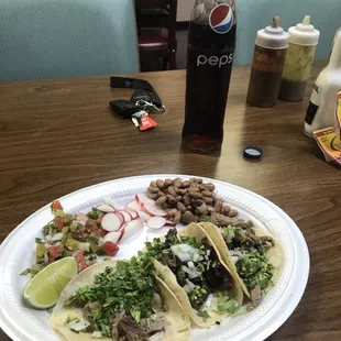 Tripa, Carne Asada, and Lengua tacos.