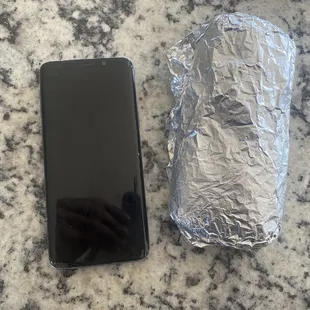 Asada burrito = $10 it literally is the size of a cell phone w a small amount of fillings