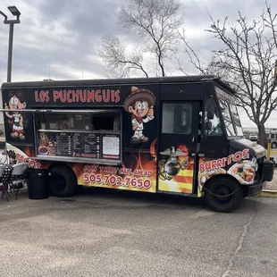 a food truck parked in a parking lot
