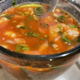 a bowl of soup with a spoon in it