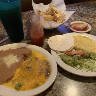 Special Lunch #1 but for dinner!! Chile Relleno, beef taco, guacamole salad and refried beans