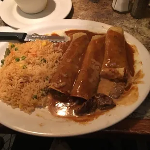 Beef enchiladas with queso sauce