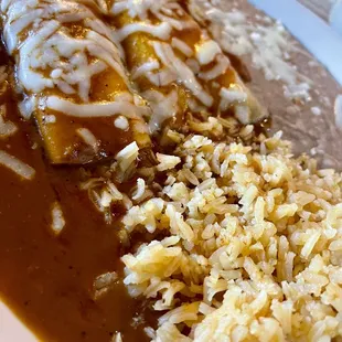 2. Two Enchiladas with Beans and Rice