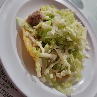 Bean and cheese house tostada which came with the meal
