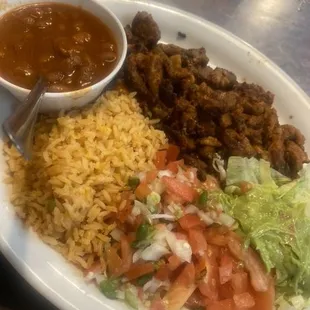 Al pastor plate is full of flavor not dry at all tender and yummy! The charro beans hit the spot!