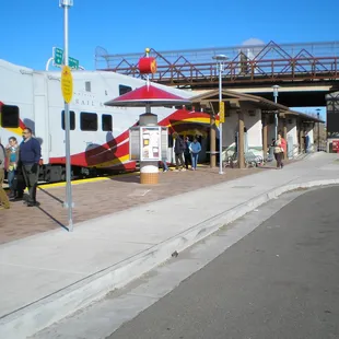 Passengers boarding the Rail Runner at the Los Ranchos Journal Center Station