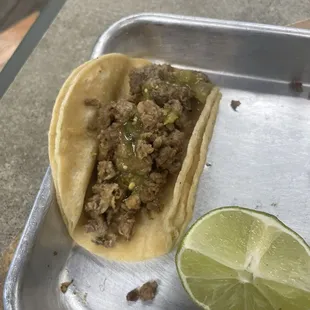 Asada taco with salsa verde