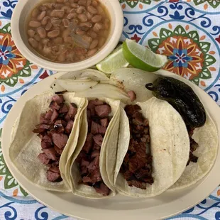 Beef fajita and sausage tacos $2 each.