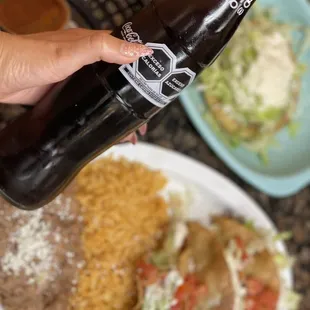 Mexican coke, tacos de papa, y un sope