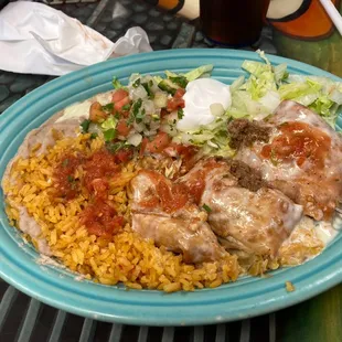 a plate of mexican food on a table