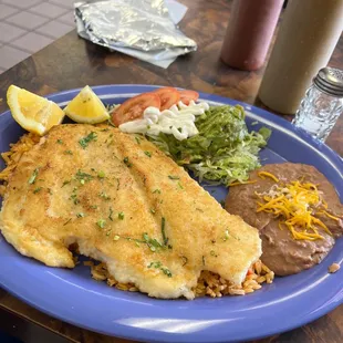 Pescado al Mojo de Ajo (Garlic Sauce) comes with tortillas. I choose flour. They do not make their tortillas