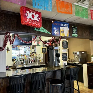 mexican flags hanging from the ceiling