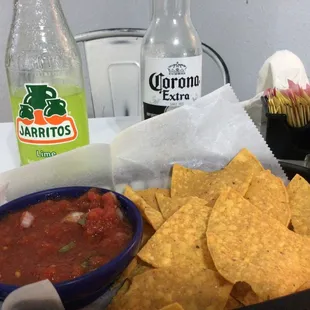 This is the chips and salsa and food also drinks too.