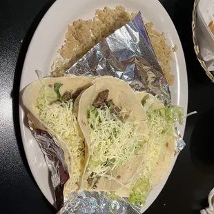 Three soft tacos with rice