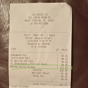 Receipt of what we were charged for the Nachos with "grilled" chicken.
