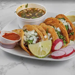 a plate of tacos