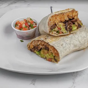 a burrito with a side of salsa