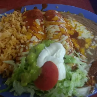 Shredded chicken enchiladas.