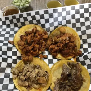 To Al Pastor, one Carnitas, and one Pollo