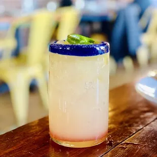 a margarita with a lime garnish