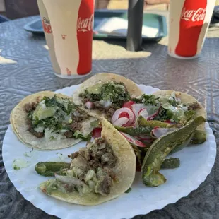 my plate of yummy asada tacos and toppings