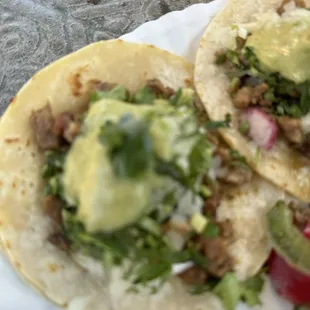 avacado sauce with onions and parsley on asada