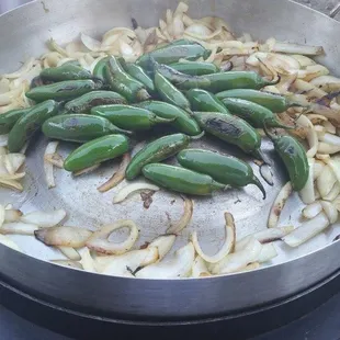 Grilled onions and jalapeños add them to your pakage Los tacos de liz