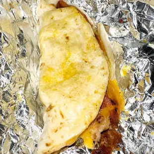a burrito wrapped in foil