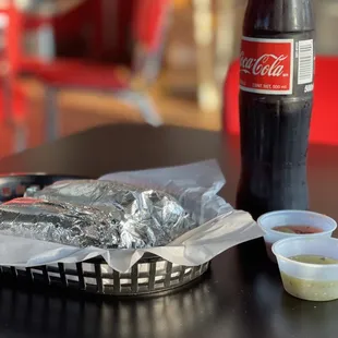Potato and egg and chorizo and egg tacos.  Mexican coke.