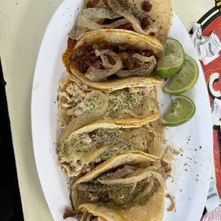 Al pastor, carnitas and pollo street tacos.