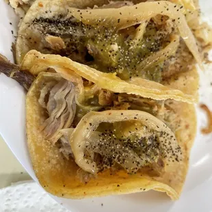 Street tacos. Chicken, carnitas and al pastor.